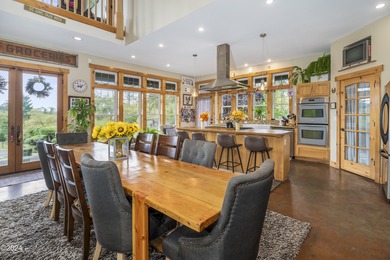 Sophisticated coastal living overlooking Devils Lake, set on a - photo 13
