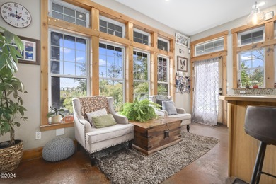 Sophisticated coastal living overlooking Devils Lake, set on a - photo 14