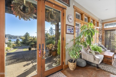 Sophisticated coastal living overlooking Devils Lake, set on a - photo 15