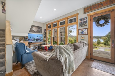 Sophisticated coastal living overlooking Devils Lake, set on a - photo 16