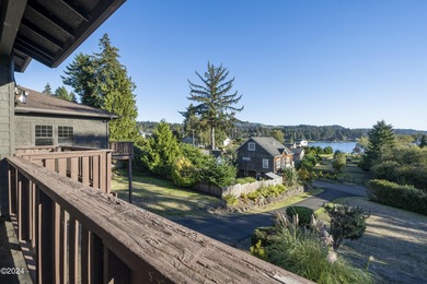 Sophisticated coastal living overlooking Devils Lake, set on a - photo 22