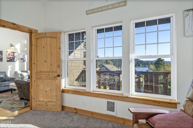 Sophisticated coastal living overlooking Devils Lake, set on a - photo 25
