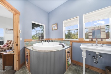 Sophisticated coastal living overlooking Devils Lake, set on a - photo 27