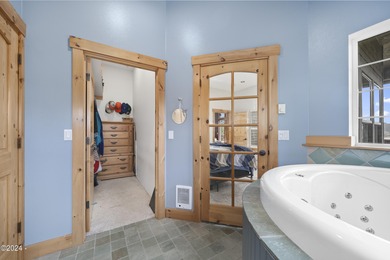 Sophisticated coastal living overlooking Devils Lake, set on a - photo 28