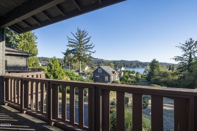 Sophisticated coastal living overlooking Devils Lake, set on a - photo 33