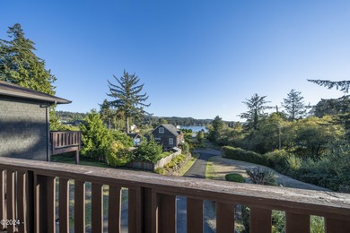 Sophisticated coastal living overlooking Devils Lake, set on a - photo 34