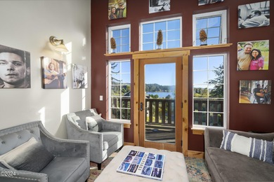 Sophisticated coastal living overlooking Devils Lake, set on a - photo 35
