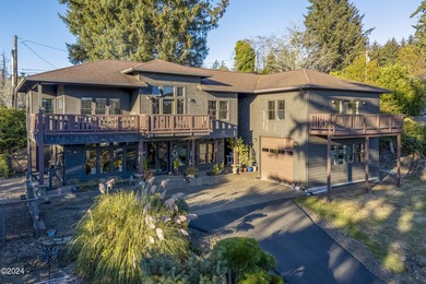 Sophisticated coastal living overlooking Devils Lake, set on a - photo 49