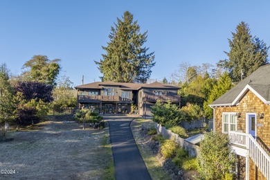 Sophisticated coastal living overlooking Devils Lake, set on a - photo 51