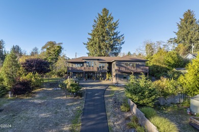 Sophisticated coastal living overlooking Devils Lake, set on a - photo 52