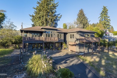 Sophisticated coastal living overlooking Devils Lake, set on a - photo 54