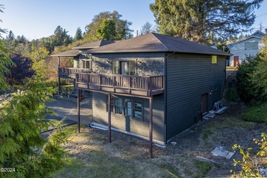 Sophisticated coastal living overlooking Devils Lake, set on a - photo 56