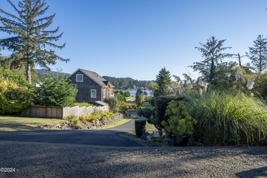 Sophisticated coastal living overlooking Devils Lake, set on a - photo 60