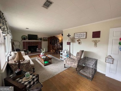 Welcome to your charming new home in Swainsboro! Backs a lake - photo 3