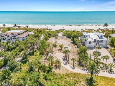 Nestled along the majestic shoreline on Sanibel, this beautiful - photo 3