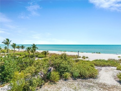 Nestled along the majestic shoreline on Sanibel, this beautiful - photo 8