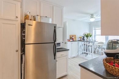 Experience the ultimate coastal lifestyle in this rare - photo 11