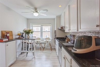 Experience the ultimate coastal lifestyle in this rare - photo 12
