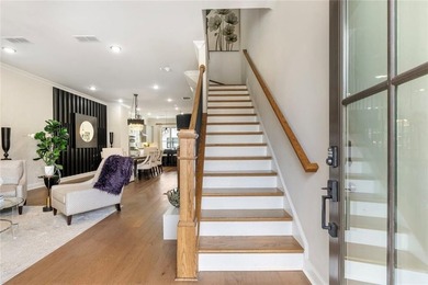 Welcome to this beautifully upgraded three-level townhouse