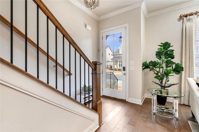 Welcome to this beautifully upgraded three-level townhouse