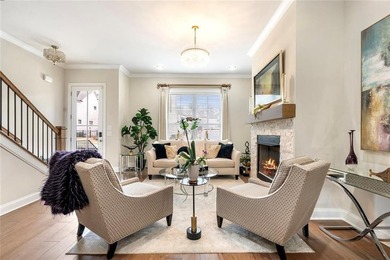 Welcome to this beautifully upgraded three-level townhouse