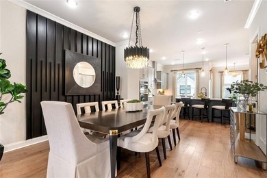 Welcome to this beautifully upgraded three-level townhouse