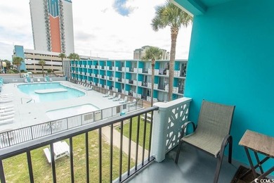 Step into beachside living with this charming one-bedroom condo - photo 18