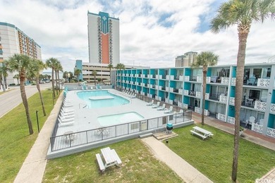 Step into beachside living with this charming one-bedroom condo - photo 21