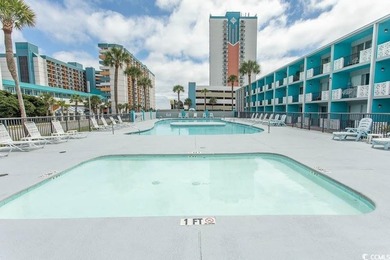 Step into beachside living with this charming one-bedroom condo - photo 23