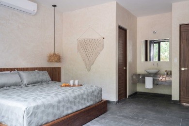 Villa 2 is a remarkable 4-bedroom, 4-bathroom residence nestled - photo 23