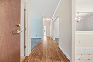 Discover comfort and convenience in this inviting first-floor