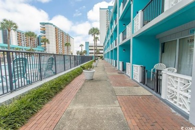 Step into beachside living with this charming one-bedroom condo - photo 27
