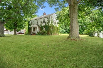 Nestled in the heart of Lindenhurst Village, this classic - photo 2