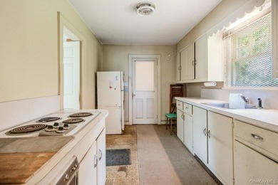 Nestled in the heart of Lindenhurst Village, this classic - photo 7