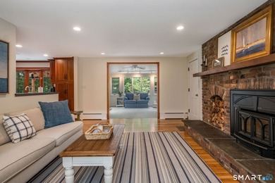 Set gracefully on a beautifully landscaped property framed by - photo 14