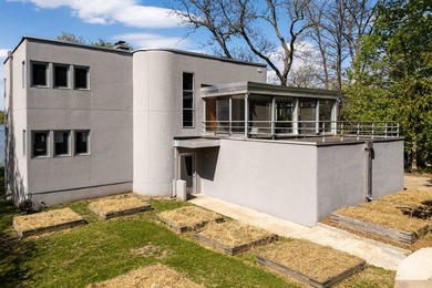 Set along a remarkable stretch of Lake Monona shoreline, this - photo 4