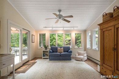Set gracefully on a beautifully landscaped property framed by - photo 15