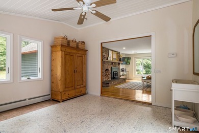 Set gracefully on a beautifully landscaped property framed by - photo 16