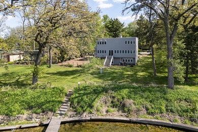 Set along a remarkable stretch of Lake Monona shoreline, this - photo 6
