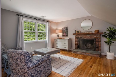Set gracefully on a beautifully landscaped property framed by - photo 20