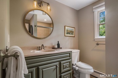 Set gracefully on a beautifully landscaped property framed by - photo 21