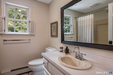 Set gracefully on a beautifully landscaped property framed by - photo 26