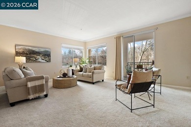 Light and bright Westbury condo located on the third floor of