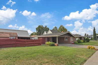 Situated on a corner lot in the sought-after Garland District