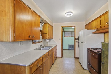 Situated on a corner lot in the sought-after Garland District