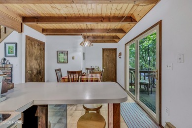 Surrounded by trees in The Hideout, a premier four-season - photo 11