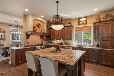 Overlooking the 13th tee in Tetherow, this exceptional home - photo 10