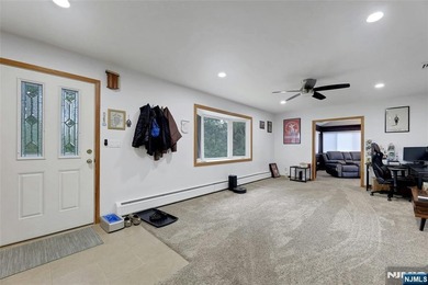 This beautiful raised ranch offers a great location with - photo 3
