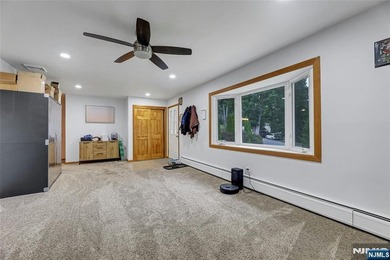 This beautiful raised ranch offers a great location with - photo 4