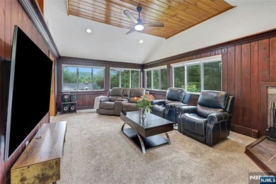This beautiful raised ranch offers a great location with - photo 6